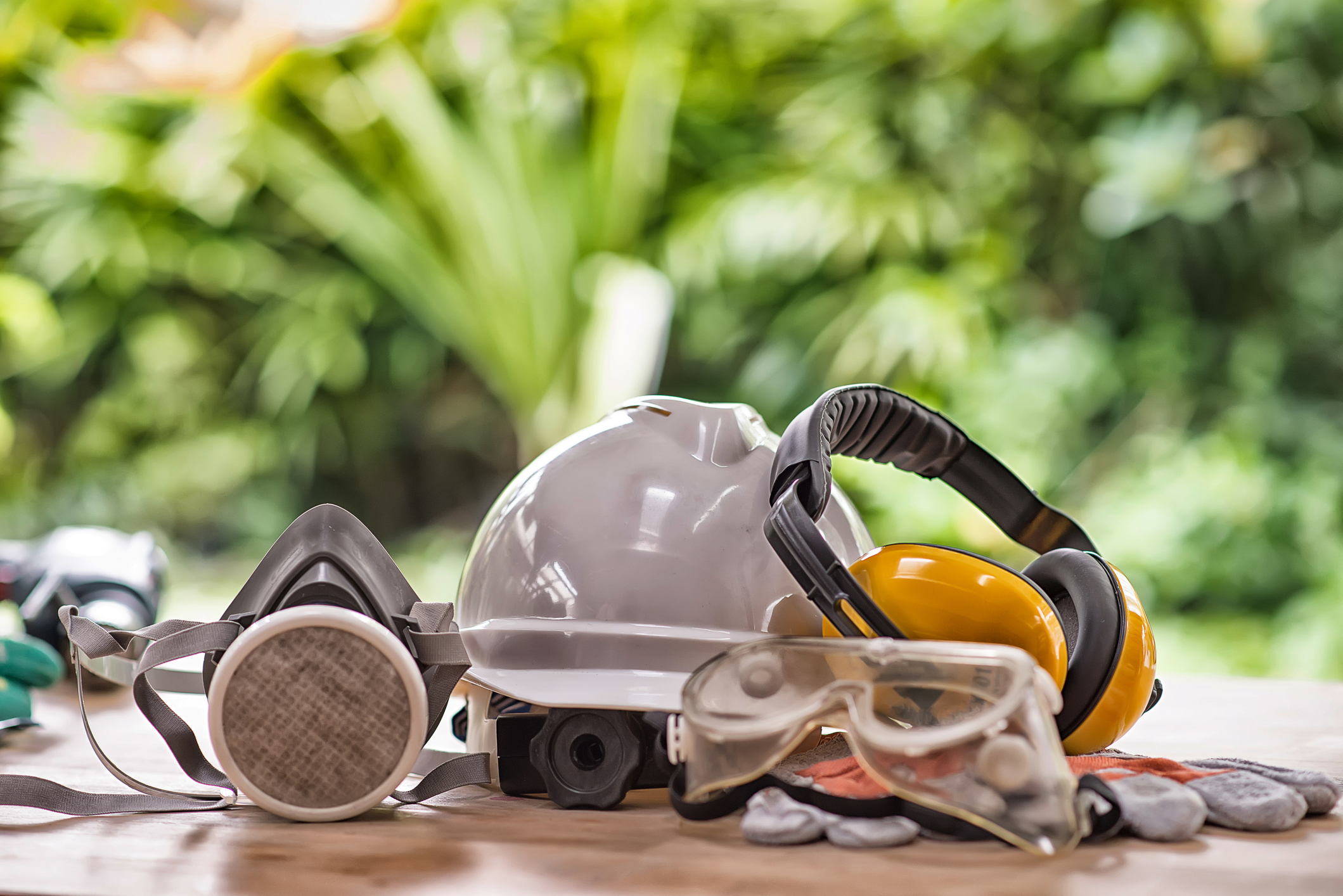 Safety standard set on working table and construction background Safety standard set on working table and construction background High Dynamic Range tone